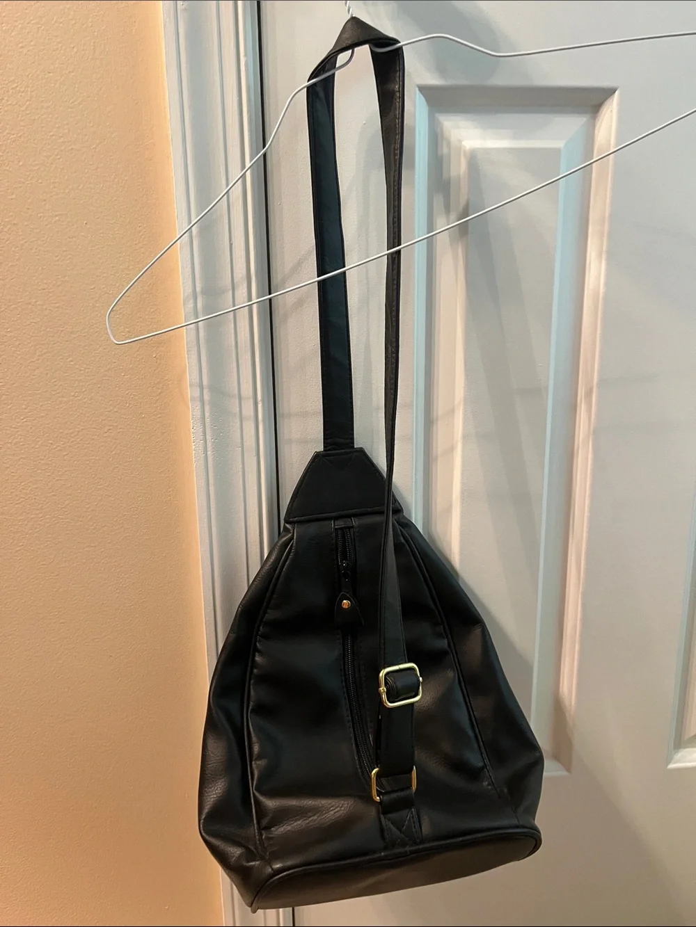 Black Leather Sling Bag with Gold Tone Lock